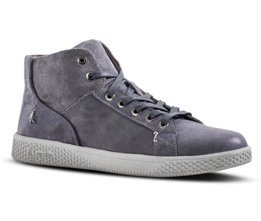 A grey sneaker with lacesDescription automatically generated